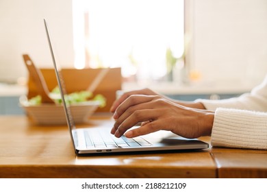 Female Hands Typing On Laptop Keyboard Closeup