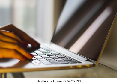 Female Hands Typing On  A Laptop, Shallow Depth Of Field