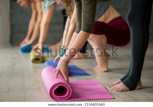 Female Hands Unrolling Yoga Mat Before Stock Photo Edit Now