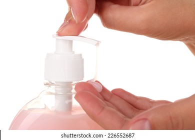 Female Hands Using Liquid Soap Isolated On White