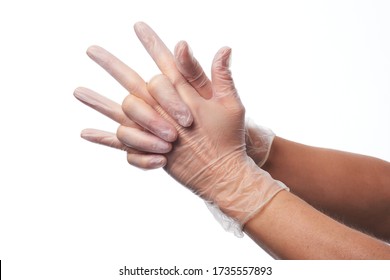 Female Hands Using Vinyl Gloves