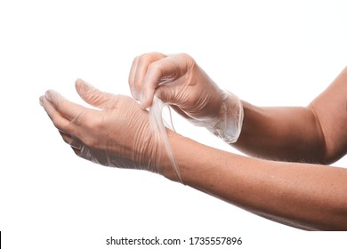 Female Hands Using Vinyl Gloves