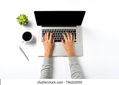 Female Hands Working On Modern Laptop. Office Desktop On White Background