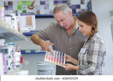 Female Hardware Store Worker Helps Buyer Customer