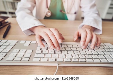 Female health worker using computer