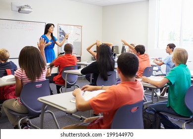 Female High School Teacher Taking Class