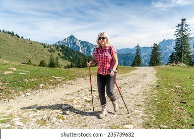 female hiker in the austrian alps - Powered by Shutterstock