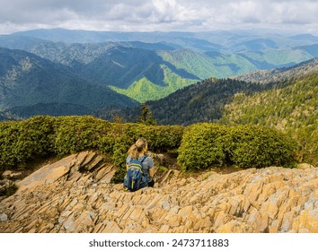 Female Hiker Enjoying View From Cliff Top Viewpoint on Mt. LeConte, Great Smoky Mountains National Park, Tennessee, USA - Powered by Shutterstock