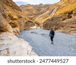 Female Hiker Entering Into Mosaic Canyon,  Death Valley National Park, California, USA