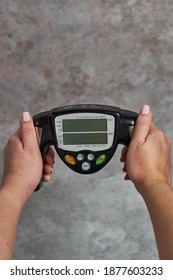 A Female Holding A Fat Loss Monitor A Grunge Background