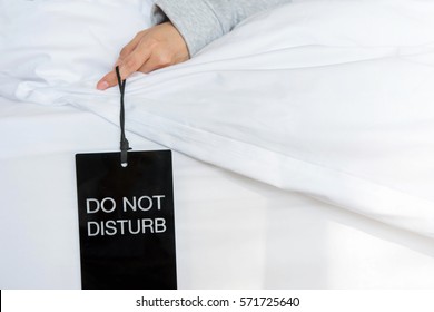 Female Holding Sign Tag : Do Not Disturb While Sleep In Bedroom