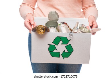 Female Holding Waste Metal In Recycling Bin