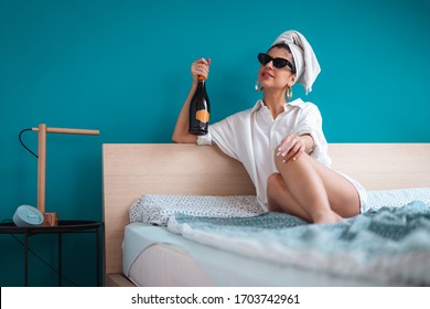 Female At Home In Quarantine Isolation Having Fun In Bedroom Drinking Wine Prosecco Champagne