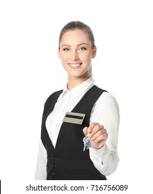 Female Hotel Receptionist Holding Room Key On White Background