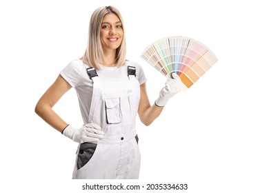 Female House Painter In A White Uniform Holding A Color Palette And Smiling Isolated On White Background