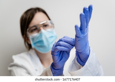 Female Human Holding Variation Of Latex Glove, Rubber Glove Manufacturing, Human Hand Is Wearing A Medical Glove, Glove, Isolated