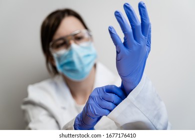Female Human Holding Variation Of Latex Glove, Rubber Glove Manufacturing, Human Hand Is Wearing A Medical Glove, Glove, Isolated