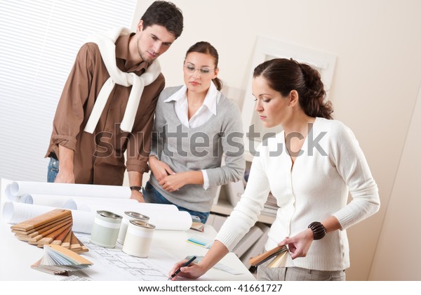 Female Interior Designer Two Clients Office Stock Photo