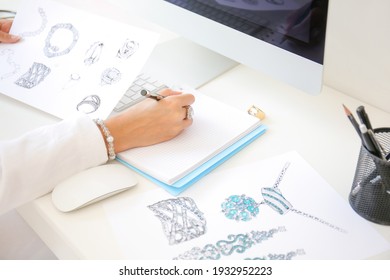 Female Jewelry Designer Working In Office