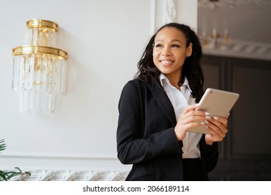 A female journalist prints a message to clients by mail. Student surf the internet on a tablet. The manager works in the office. The financier checks the balance online. - Shutterstock ID 2066189114
