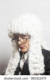 Female Judge Wearing A Wig With Eyeglasses  On White