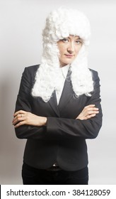 Female Judge Wearing A Wig On White