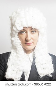 Female Judge Wearing A Wig On White