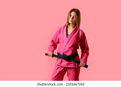 Female Karate Instructor On Color Background