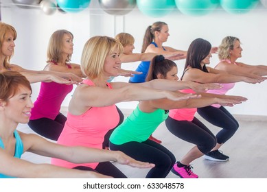 Female Keep Fit Exercising Stretching Class