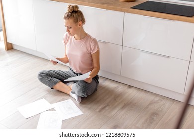 Female Lawer Is Working At Home.problems With Loan.side View Full Length Photo