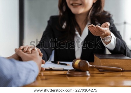 Female lawyer discussing law with businessman. Legal counsel and the concept of litigation mediation.