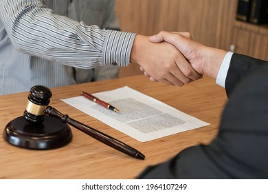 Female Lawyer Handshake With Client. Business Partnership Meeting Successful Concept