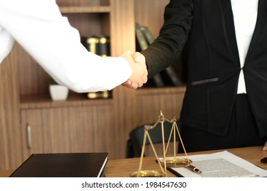 Female Lawyer Handshake With Client. Business Partnership Meeting Successful Concept