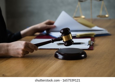 female lawyers working at the law firms. Judge gavel with scales of justice. Legal law, lawyer, advice and justice concept.