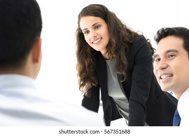 Female Leader Paying Attention To Her Colleague At The Meeting