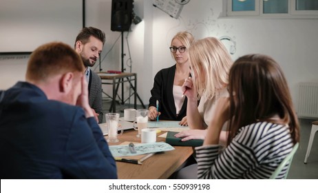 Female Leader Reported Bad News Of Company's Development, Everyone Is Upset. Business Team In A Modern Startup Office.