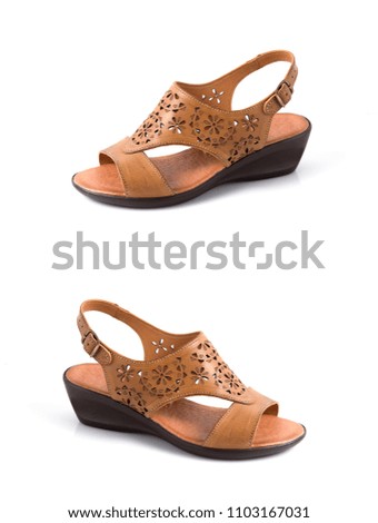 Female leather elegant sandals on white background, comfortable footwear.