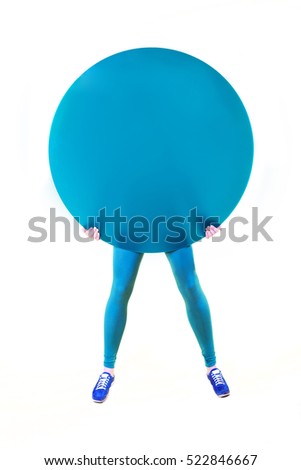 female legs in blue tights and a blue circle on a white background. concept smiley sign. Idea. Smiley with legs. balloon Man. woman circle.
