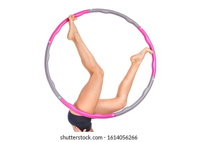 female legs in the center of the hula hoop