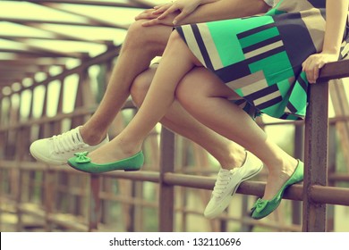 Female Legs And Green Shoes