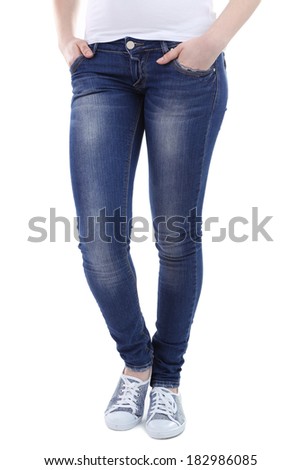 Female legs in jeans isolated on white
