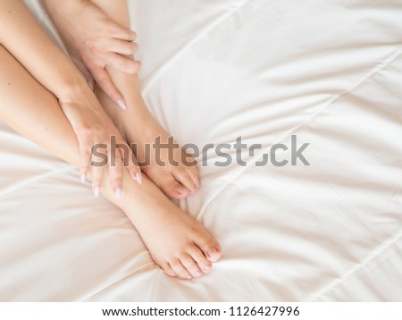 Similar – Image, Stock Photo legs Bed Feminine