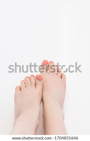 female legs on a white background