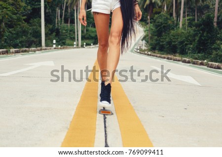 Image, Stock Photo Brunette girl holding surfboard over head and walking