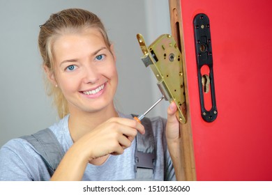 Female Lock Smith Posing And Smiling