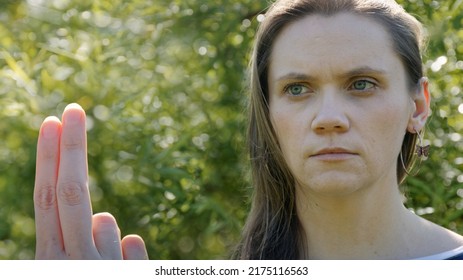 Female looking at therapist fingers. EMDR Eye Movement Desensitization and Reprocessing concept.