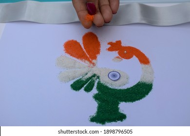 Female Making Rangoli Design Of Tricolored Design Saffron White And Green On Occasion Of Indian Republic Day Eve Celebration