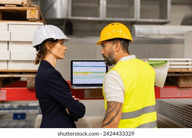 Female manager scolding employee in modern industry factory. Worker making mistake. Production manger is angry, dissatisfied for worker's poor quality work, safety viaolations. - Powered by Shutterstock