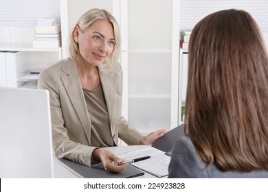 Female Managing Director In A Job Interview With A Young Woman.