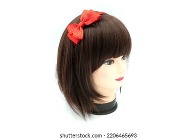 Female Mannequin With Hair Band Of Colored On Head. High Quality Photo